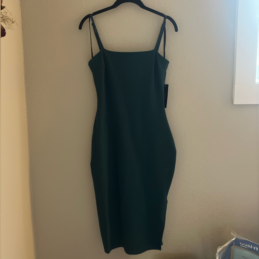New form fitting midi dress.